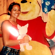 April at Disneyworld, Florida. Taking a photo with Winne the Pooh and Tiger too, for her Mom, Denise.