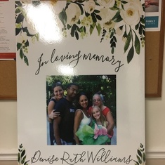 “In memory of Denise Ruth Williams” posters in the church and at the reception adding color & beauty