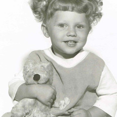 pigtails and teddy bear