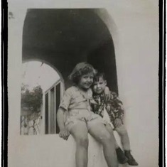 Dennis about age 7 with his cousin