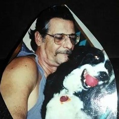 Dennis with one of his dogs