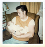 My father holding me as a baby.