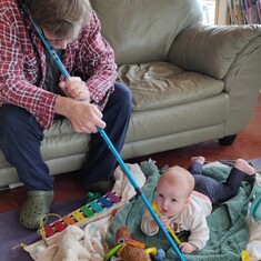 Hannah loved playing with Grandpa's blue hiking pole. August 2020