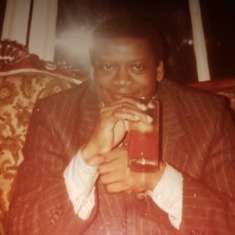 It's the eyes. Desmond drinks a Bloody Mary at the Waldorf in London.   Photo kindly provided by Edward Fashole-Luke II