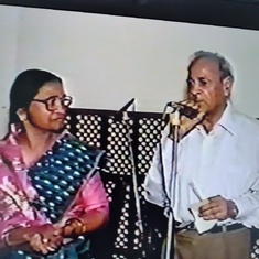 Sukumar Tauji doing the introduction of family at Babaji's 100th Birthday, Smarika Vimochan