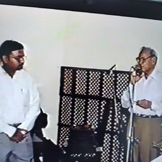 Sangeet being introduced at Babaji's 100th Birthday, Smarika Vimochan