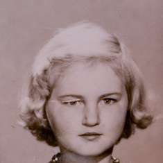 Diana's School Picture, 1954.  (This pic has a scratch on one of the eyes.  She did not get kicked by a mule.)