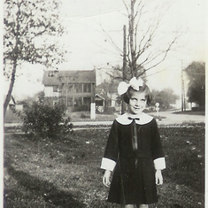 Dolores in school uniform.
