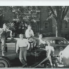 Picture of the Immaculate Conception high school class of 1946.  Left to right:  Don Goodyear, Tom Ironside (owner of Model A Ford), Jerry Nilles, Ray Bader, and 2 ringers, Gus Costello and Zeb Weldon