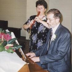 Don played piano, Mary Lou played recorder during the reception at Amy and Roger's wedding.