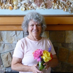 Mary Lou holding flowers