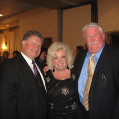 2011 South County Chamber Dinner Auction
Don, Donna Schumann & Kevin Openlander
trying to tell her the CUBS will NEVER be in a World Series....
