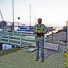 This is Don birding at Morro Bay in the last light of the day.