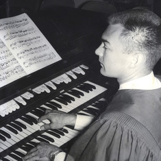Don playing organ