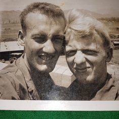 Daddy in the army with his buddy 