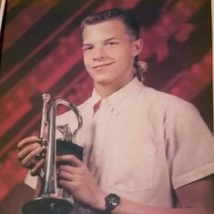 Senior picture, he loved "Precious" his king silver coronet.
