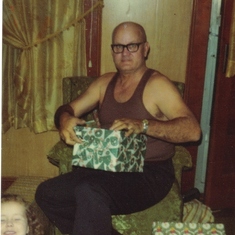 Dad enjoying his gifts from his loved ones