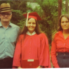 Dad, Dreama, and me during her graduation from Southern