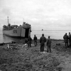 An L.S.T. backing off the beach, leaving for site 3. 28 July 1952.