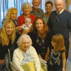 Baby Avery Hindman with the family and Hazel Hill Skaggs