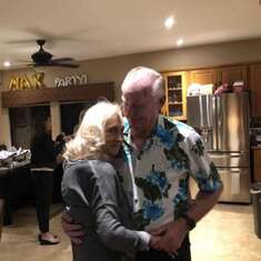 Nancy and Don dancing in the kitchen