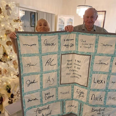 Nancy and Don Hill with Family Quilt to celebrate their anniversary