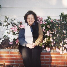 Mom Sitting Outside with Flowers