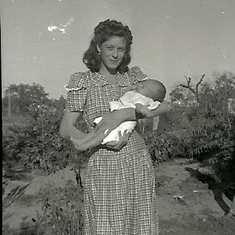 Donna being held by her mother, Aunt Minnie.