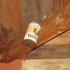 Dad's sense of humor:  nail your "empties" right into the roof rafters with a framing nail - Construction of the addition at Ten Mile, 1953.  Still there 60 years later