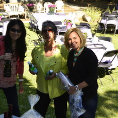 Joy, Ilene, & Katie setting up the bar at Dori's Celebration