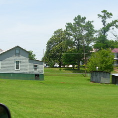 Dee's childhood home and the outhouse