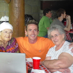 Gary sharing photos of our Alaskan cruise with Mom & her sister, Aunt Shirley. This photo was taken on June 18, 2011 at the Wallace Family Reunion at Lake Ahquabi