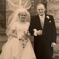 Stewart's bride on the arm of her father