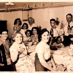 Mom's sister Diana's Confirmation party, basement 82nd Street. Circa 1952. Mom is on the far left. Counter clockwise from Mom: Joe Azzaro, Mom's mom, Josie, grandma's sister Nancy Prochilo, Jesse Prochilo. Back row from left: Cousin Lena (my Godmother! an