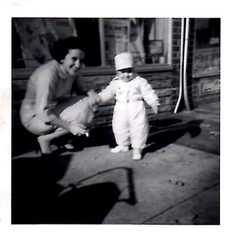 Happy mom. First baby. Steven was born Oct 1956 so this must be about a year later, '57 or early '58.