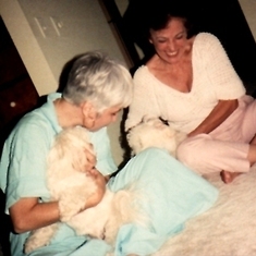 With her sister, Diana, & pups. Loved to see her laugh like this!