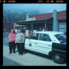 Dorothy Jane with sister Julie Council in front of Mayberry's Sherriff car in "Mayberry" Mt Airy North Carolina.2012