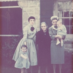 With her mom (right), grandmother (center), Chelsea (left) and Lori (in Grace's arms)