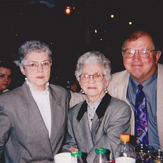 With her mom and brother Jim.