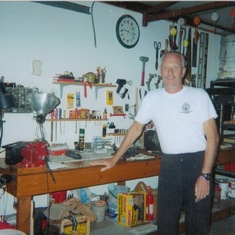 Doug at his work bench in his barn.