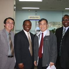 Dr. Carew with Sesi, Caleb, and Caleb's brother-in-law in Chong-Shin Presbyterian Seminary in Seoul in 2008.
