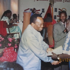 Dr. Carew and Moses Menga at  NEGST July 2005. May his soul rest in peace