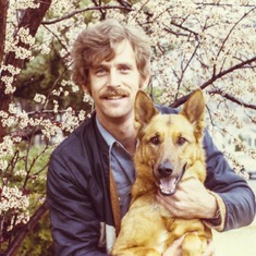 Doug loved dogs. He's pictured here with Penny.