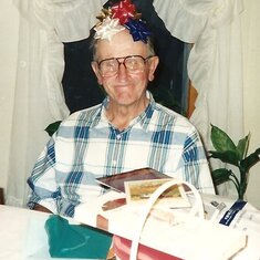 Grandkids made it a habit to always put  bows on Grandpa's bald head!