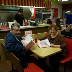 Doug's favorite booth at Snuffy's. Thom Taylor & wife Conetta eating in Doug's rememberence.