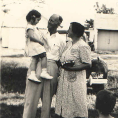 Emma with her parents, George and Grace Mellard