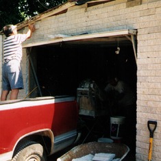 Dad fixing the Garage at Joe's House