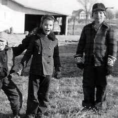Pat (middle child) and his brothers on the farm in Lawrence.