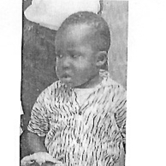 Femi as a child