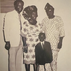 Daddy with Engineer and Mrs Lawal and their son Kola Lawal in 1974.A second family to Daddy.